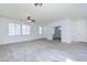 Expansive living room with abundant natural light and neutral color palette at 3514 S Posse Trl, Gilbert, AZ 85297