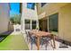 Staged patio with outdoor seating and brick flooring at 3514 S Posse Trl, Gilbert, AZ 85297
