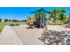 Community playground with a slide and climbing structure, offering outdoor fun for children at 3514 S Posse Trl, Gilbert, AZ 85297