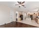 Open floor plan showcasing the living room and kitchen with light-colored cabinets at 371 W Indigo Dr, Chandler, AZ 85248