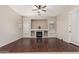 Cozy living room with a fireplace, built-in shelving, and natural light at 371 W Indigo Dr, Chandler, AZ 85248