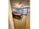 This bedroom features carpet, ceiling fan, window with shutters, and modern light-blue wall paint at 3891 E Simpson Rd, Gilbert, AZ 85297