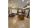 Well-appointed kitchen with granite countertops, wooden cabinets, and a stainless steel refrigerator at 3891 E Simpson Rd, Gilbert, AZ 85297