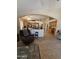Spacious kitchen with a view into the living room and an expansive counter seating area at 3891 E Simpson Rd, Gilbert, AZ 85297