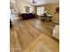 Cozy living room with hardwood floors, a comfortable sofa, and ample natural light at 3891 E Simpson Rd, Gilbert, AZ 85297