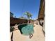 Relaxing backyard pool area with desert landscaping and string lights for evening ambiance at 3891 E Simpson Rd, Gilbert, AZ 85297