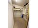 The walk-in closet has carpeted floors, racks and shelving at 3891 E Simpson Rd, Gilbert, AZ 85297