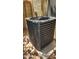 Residential air conditioning unit against an exterior wall with textured finish at 400 W Crofton St, Chandler, AZ 85225