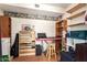 Finished basement with shelving, keyboard, and decorative accents, offering versatile space at 400 W Crofton St, Chandler, AZ 85225