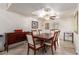 Traditional dining room featuring a wood table with upholstered chairs and a built-in buffet cabinet at 400 W Crofton St, Chandler, AZ 85225