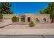Charming single-story home with a well-maintained stucco exterior and inviting curb appeal at 400 W Crofton St, Chandler, AZ 85225