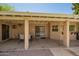 Spacious covered patio area with a bar and outdoor seating, perfect for enjoying the pool view at 400 W Crofton St, Chandler, AZ 85225