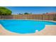 Inviting backyard pool with clear blue water and well-maintained perimeter, perfect for relaxation and entertainment at 400 W Crofton St, Chandler, AZ 85225