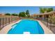 Inviting fenced-in pool for relaxing and swimming in the backyard, perfect for enjoying sunny days and outdoor activities at 400 W Crofton St, Chandler, AZ 85225