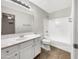 Bathroom featuring a shower/tub combo, neutral walls, and a vanity at 4229 E Betsy Ln, Gilbert, AZ 85296