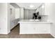 Spacious kitchen with an island, quartz countertops, and ample cabinet space at 4229 E Betsy Ln, Gilbert, AZ 85296