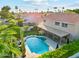 Charming residence with a private backyard oasis featuring a pool and lush landscaping at 4563 E Libby St, Phoenix, AZ 85032