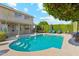 Enjoy the large pool and spa in this beautiful and lush backyard space at 4563 E Libby St, Phoenix, AZ 85032
