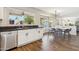 Bright kitchen featuring lots of windows, white cabinets and updated stainless steel appliances at 4563 E Libby St, Phoenix, AZ 85032