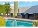 Inviting pool area with lounge furniture and desert landscaping offering a relaxing outdoor space at 4563 E Libby St, Phoenix, AZ 85032