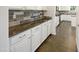 Modern kitchen with sleek countertops, stainless steel appliances, and white cabinets at 4990 E Odessa Dr, San Tan Valley, AZ 85140