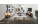 Modern living room with white sofa, striped rug, stylish furniture, and plenty of natural light at 4990 E Odessa Dr, San Tan Valley, AZ 85140