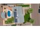 Stunning aerial view of the home featuring a private pool, solar panels, and well-maintained landscaping at 6255 E Rose Circle Dr, Scottsdale, AZ 85251