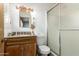 Bathroom featuring classic fixtures and a wood vanity with ample counter space and wood cabinets at 6255 E Rose Circle Dr, Scottsdale, AZ 85251