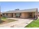 Charming single-story home features mature landscaping and a covered carport at 6255 E Rose Circle Dr, Scottsdale, AZ 85251