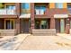 Townhome community featuring multiple units with desert landscaping and private entries at 6745 N 93Rd Ave # 1129, Glendale, AZ 85305