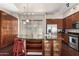 Well-equipped kitchen features ample cabinet space, stainless steel appliances, and a breakfast bar with seating at 6745 N 93Rd Ave # 1129, Glendale, AZ 85305