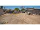 Expansive backyard ready for customization, featuring a storage shed and mature landscaping at 6802 S 47Th St, Phoenix, AZ 85042