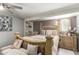 Inviting bedroom with a decorative bedframe, soft lighting, and built in shelving at 6802 S 47Th St, Phoenix, AZ 85042