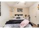 Serene bedroom with plush bedding, decorative pillows, and matching bedside tables at 6802 S 47Th St, Phoenix, AZ 85042