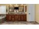 Bathroom features dual sinks with wood cabinets, granite countertop and a bathtub at 735 W Kelton Ln, Phoenix, AZ 85023