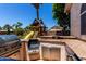 Well-equipped outdoor kitchen area featuring a built-in grill, countertop space, and stainless steel storage at 735 W Kelton Ln, Phoenix, AZ 85023