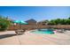 Backyard oasis featuring a pool, patio furniture, and privacy fencing, perfect for outdoor entertaining at 757 W Carob Way, Chandler, AZ 85248