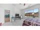 The main bedroom features tile flooring, a fan, a large window, and ensuite bathroom at 757 W Carob Way, Chandler, AZ 85248