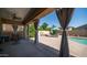 An airy covered patio overlooks the backyard, perfect for outdoor relaxation and entertainment at 757 W Carob Way, Chandler, AZ 85248