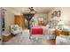 Bedroom features a walkout patio, ceiling fan, natural lighting, and stylish decor at 7635 S Taylor Dr, Tempe, AZ 85284