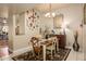 Cozy dining room showcasing a chandelier and wall decor, creating a welcoming atmosphere at 7635 S Taylor Dr, Tempe, AZ 85284