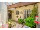 Inviting front porch with a decorative door and a lush garden area at 7635 S Taylor Dr, Tempe, AZ 85284