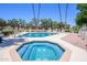 Community pool and spa surrounded by lounge chairs and shaded pergolas, great for recreation at 7635 S Taylor Dr, Tempe, AZ 85284
