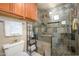 Bathroom features beautifully tiled shower with built-in niche and glass enclosure, adding luxury at 7635 S Taylor Dr, Tempe, AZ 85284