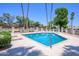 Community swimming pool with ample lounge chairs offers a relaxing oasis for residents at 7635 S Taylor Dr, Tempe, AZ 85284