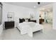 Main bedroom featuring a decorative rug, stylish furnishings, and ample natural light at 7774 E San Fernando Dr, Scottsdale, AZ 85255