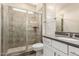 Bathroom featuring a walk-in shower with tile surround and white vanity with countertop at 778 W Lowell Dr, San Tan Valley, AZ 85140