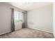 Clean and spacious bedroom featuring natural light, carpet and ceiling fan at 778 W Lowell Dr, San Tan Valley, AZ 85140