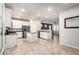 Open kitchen featuring white cabinets, stainless steel appliances, and a center island at 778 W Lowell Dr, San Tan Valley, AZ 85140