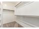 Walk-in closet providing ample storage space with built-in shelving and racks at 778 W Lowell Dr, San Tan Valley, AZ 85140